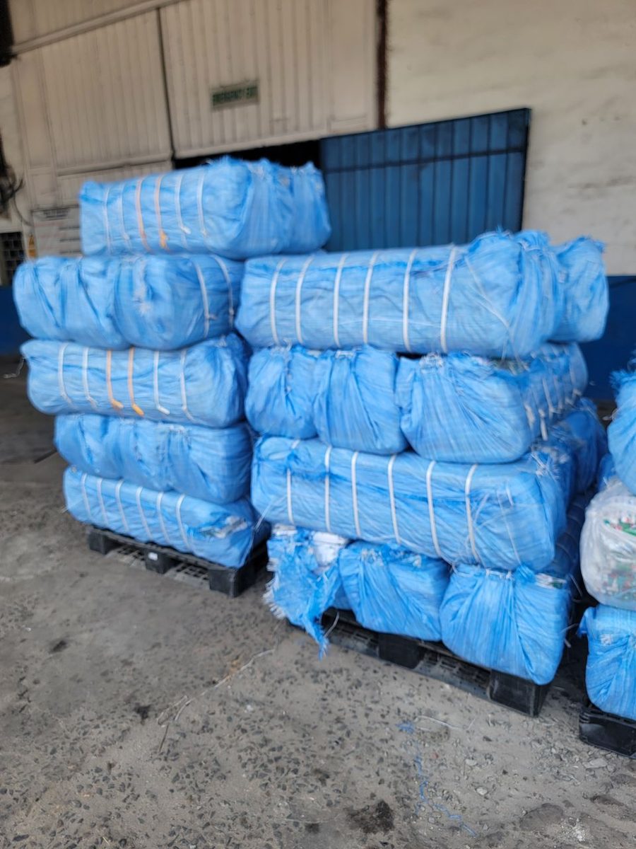 Blue-wrapped Ankara bales ready to ship